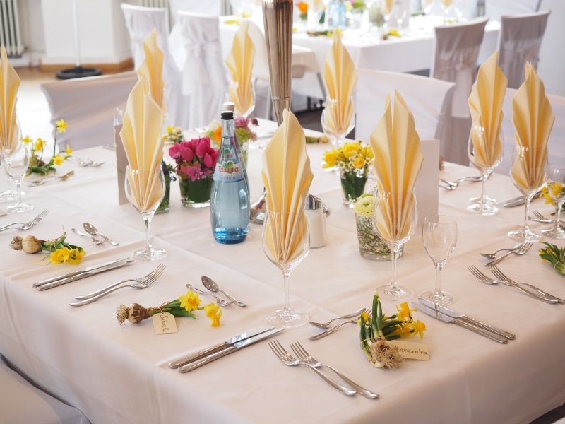 silverware, indoors, board, luxury, table, covered, steel, wedding table, glass, dining, wedding feast, creativity, place setting, nature, napkin, flower arrangement