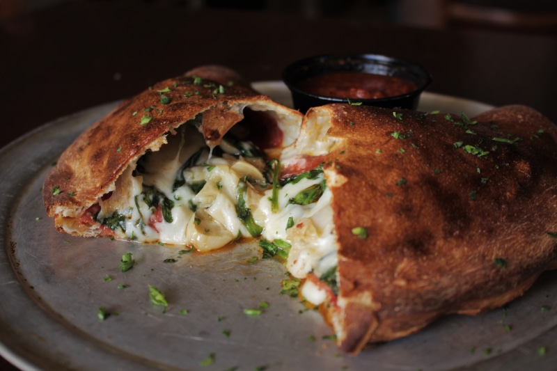 5K, pizza, wellbeing, empanada, bread, sandwich, steel, serving size, plate, still life, meat, calazone, food, healthy eating, freshness, no people, focus on foreground