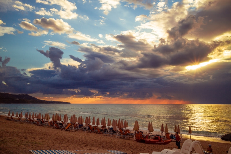 nature, daytime, summer, dramatic sky, tranquil scene, scenics - nature, near, sea, holiday, clouds, tranquility, umbrella, sunlight, horizon over water