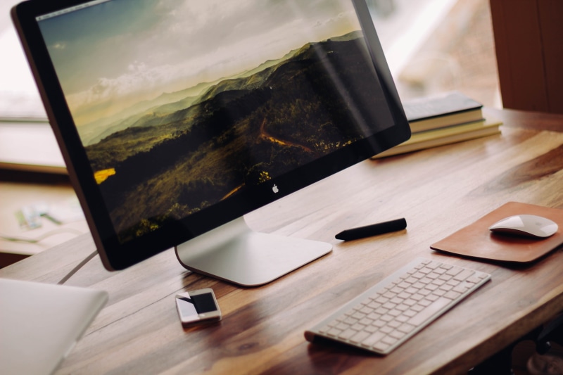 wireless technology, near, mac, screen, desktop, glass, smartphone, monitor, connection, wood - material, laptop, working, desk, day, turned, no people