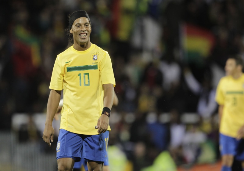 athlete, standing, smiling, s, football, soccer uniform, competitive sport, focus on foreground, yellow, brazil, soccer player, sport, happiness, men, outdoors
