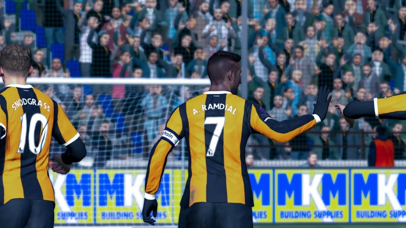 human limb, video games, soccer clubs, focus on foreground, real people, 720P, people, outdoors, incidental people, stadium, Hull City, three quarter length