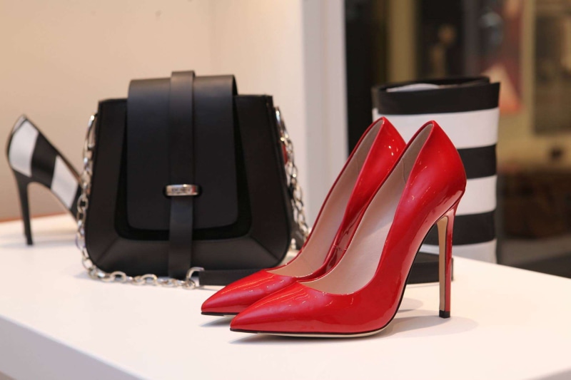 adult, contemporary, fashion, bag, wealth, personal accessory, retail, stiletto, shopping, shop, dress shoe, boutique, sales, shoes, females, indoors, luxury