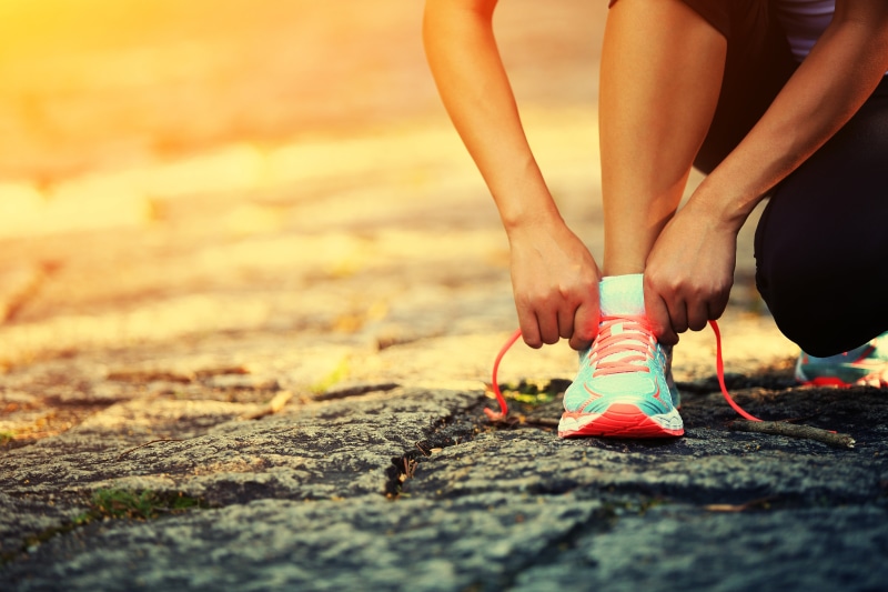 healthy lifestyle, human foot, low section, one person, asphalt, shoe, day, limb, leisure activity, real people, pink, adult, human limb, women, body part
