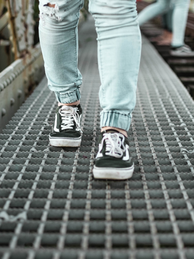 standing, one person, van, shoe laces, human limb, offspring, denim, human, old, low, shoe, sneakers, childhood, jeans, city, jogger, clothing, brick, walking