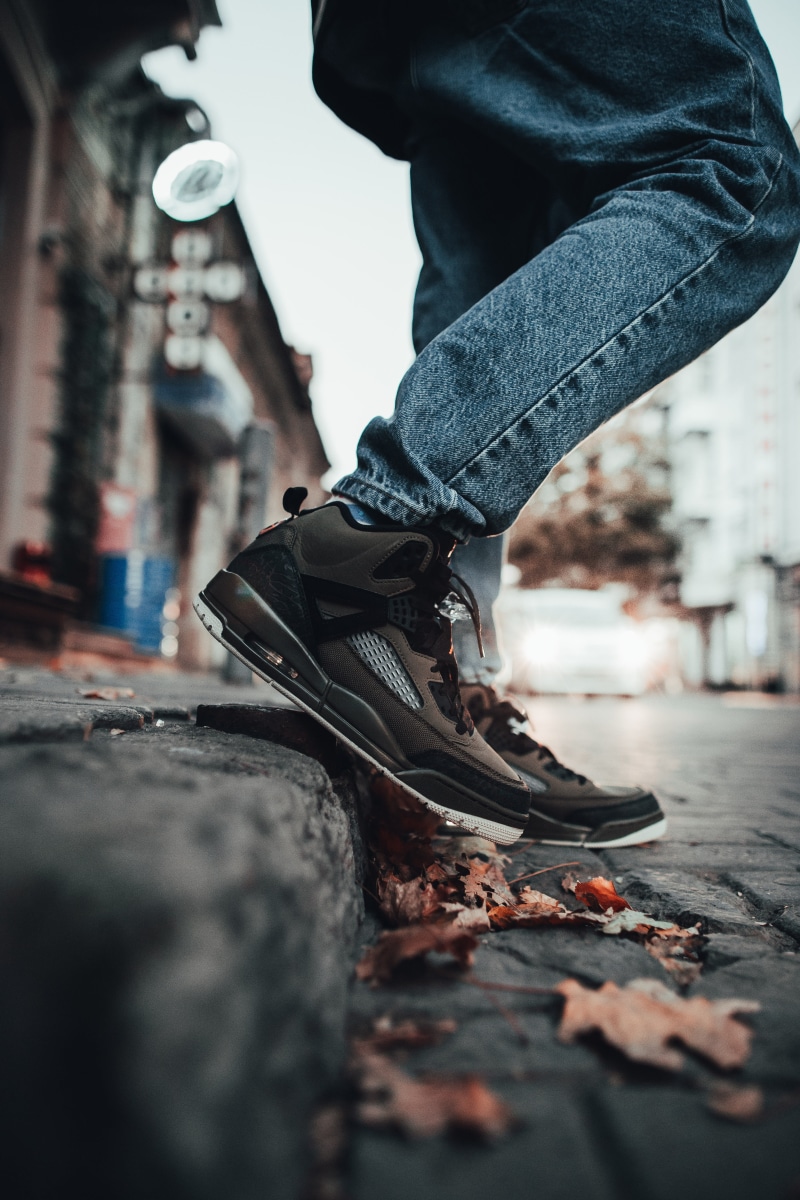 shoe, street, feet, kicks, shoes, streetwear, footwear, city, skateboard, human body part, jordan, man, outdoors, body part, surface level, brand jordan