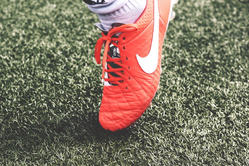 leisure activity, running, jogging, day, Nike, marathon, white, human limb, limb, real people, person, close-up, human Foot, football, unpaired, orange
