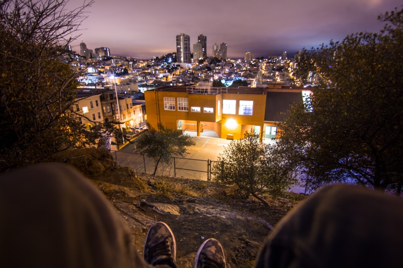 storey, human, sneakers, human body part, building exterior, downtown, apparel, town, clothing, house, city, built structure, person, 5K, across, metropolis