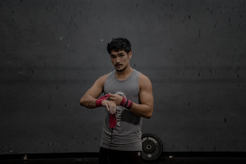standing, human, wall - building feature, young adult, gym, sport, sports training, sports, exercising, person, man, athlete, health, exercise, wearing