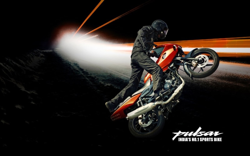 mode of transportation, stunt, speed, transportation, sports helmet, outdoors, risk, land vehicle, crash helmet, blurred motion, one person, headwear, bajaj