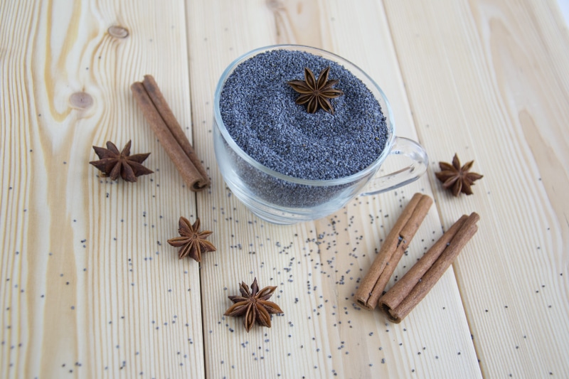 cardamom, anise, dried food, high angle view, mack, vanilla, wooden background, crockery, kitchen, food and drink, tea, wood - material, sugar, star anise