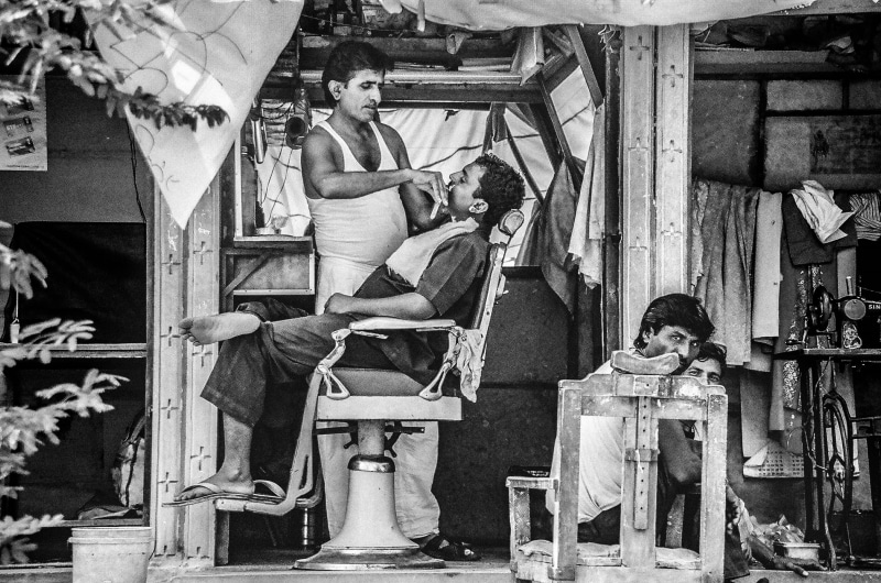 man, cultures, males, time, creativity, trimming, adult, old, barbershop, representation, child, built structure, sculpture, statue, outdoors, women, gray scale
