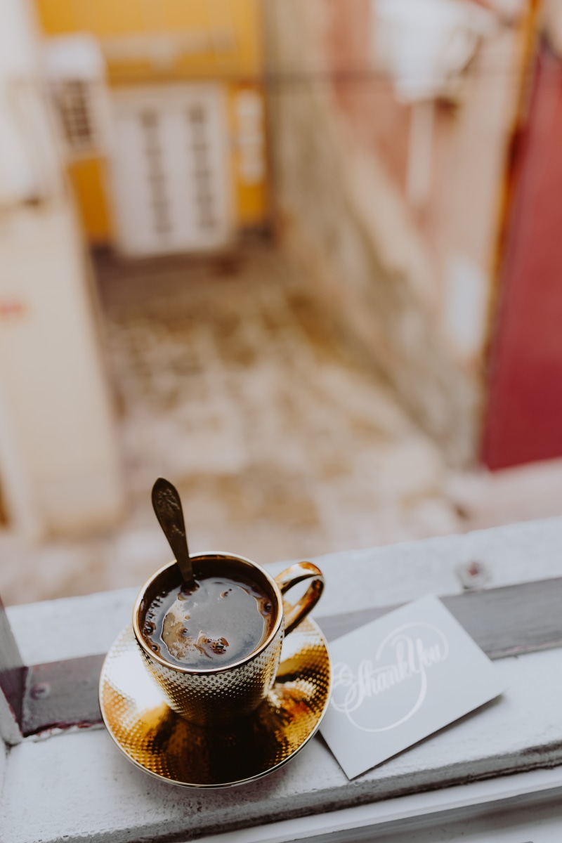 indoors, cup, coffee, isola, food and drink, table, focus on foreground, morning, window, gold cup, cafe, tea, golden, drink, mug, black coffee, slovenia