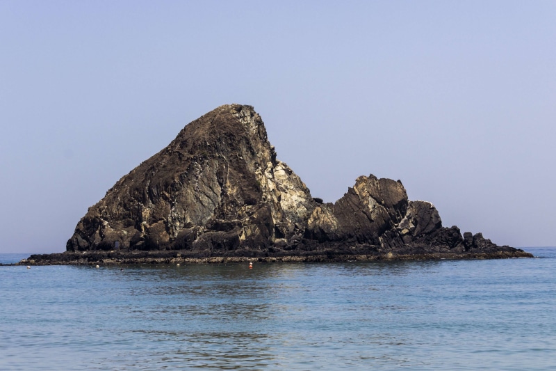 rock formation, beauty in nature, united arab emirates, land, mountain peak, scenics - nature, sea, fujairah, waterfront, idyllic, rock - object, tranquil scene