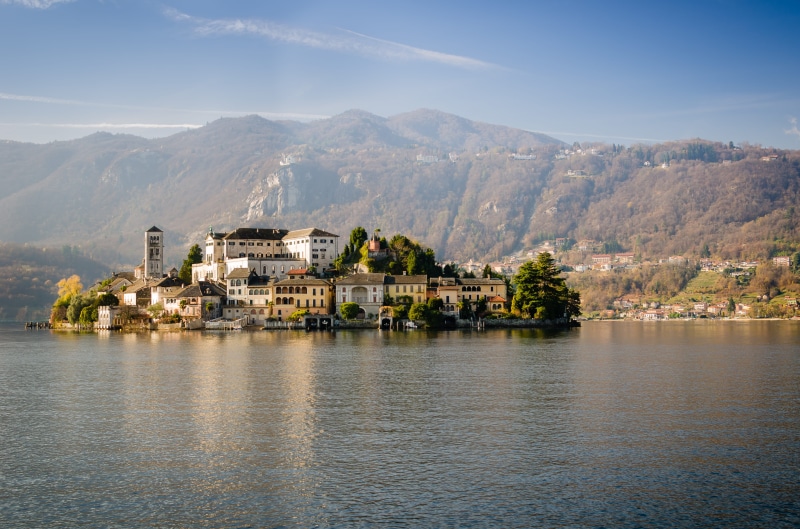 lake, neighborhood, 4K, scenics - nature, surrounded, scenery, island, travel destinations, residential district, isola san giulio, land, concrete, city
