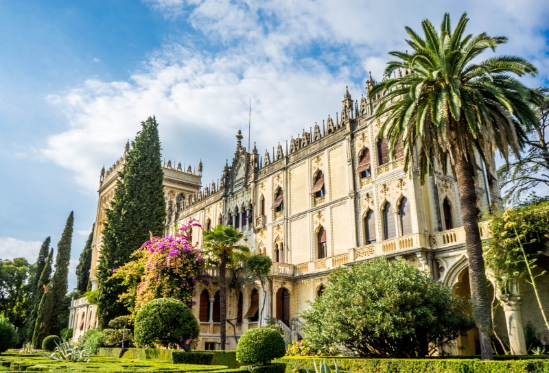 landscape, cloud - sky, palm trees, no people, place of worship, clouds, sky, nature, lake garda, architecture, vacation, famous Place, island, castle