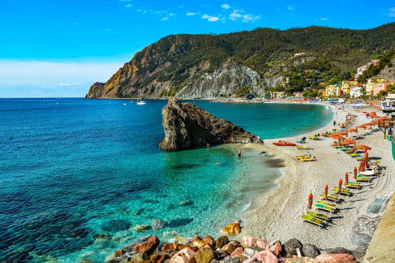 shore, bay, mountain, sandy beach, italian, umbrellas, rock - object, paradise, sand, scenics - nature, sea, relax, solid, water, travel, lifestyle, idyllic