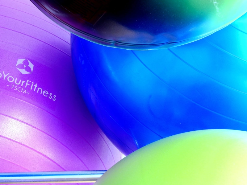 exercise ball, medicine ball, purple, stability, blue, still life, medical, high angle view, ball, back exercises, group of objects, glass, scientific experiment