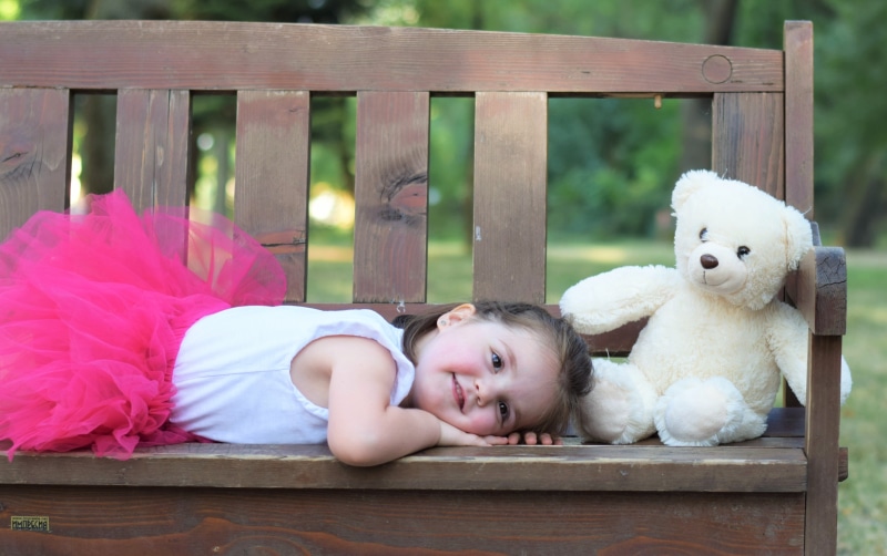one person, kid, females, daytime, day, relaxation, leisure activity, child, girls, innocence, 4K, women, people, looking at camera, smiling, beside, teddy Bear