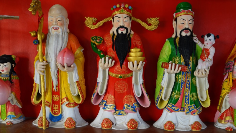 board, age, no people, cultures, the chinese people, multi colored, hakon kasio, indoors, the china doll, creativity, belief, human representation, religion