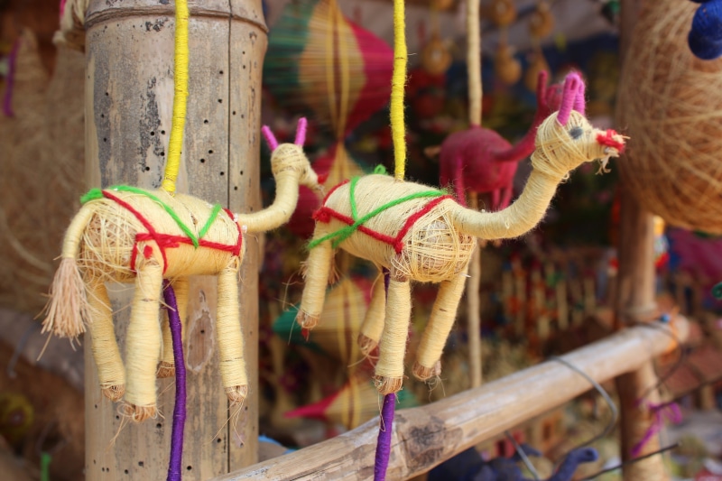 people, close-up, animal, konark, sun, creativity, animal themes, bhubaneswar, multi colored, wheel, hanging, outdoors, tourism, puri, art and craft, india
