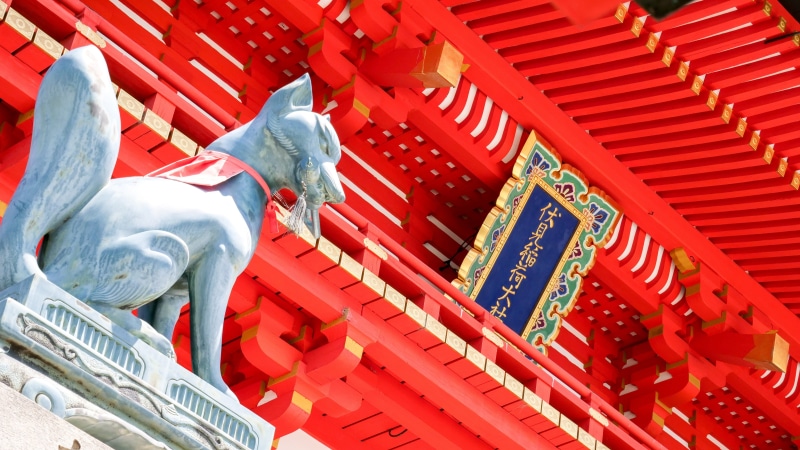 tourism, non-western script, statue, script, building, spirituality, fushimi inari shrine, representation, sculpture, no people, communication, building exterior