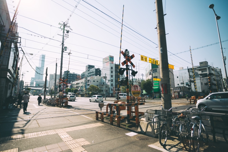 clear sky, mode of transportation, car, cable, transportation, motor vehicle, train, tokyo, electricity, quiet, street, kansai, land vehicle, outdoors