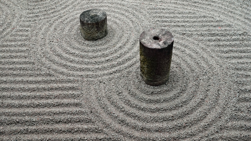 garden, single object, textured, close-up, outdoors, still life, sunlight, sand, land, full frame, beach, circle, metal, day, kyoto, japan, no people, nature