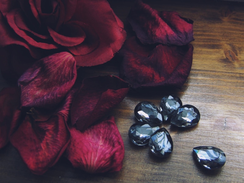 romantic, petal, flowering plant, symbols, petals, beauty in nature, close-up, jewelry, red, wood - Material, flower head, onyx, dry, no people, tears