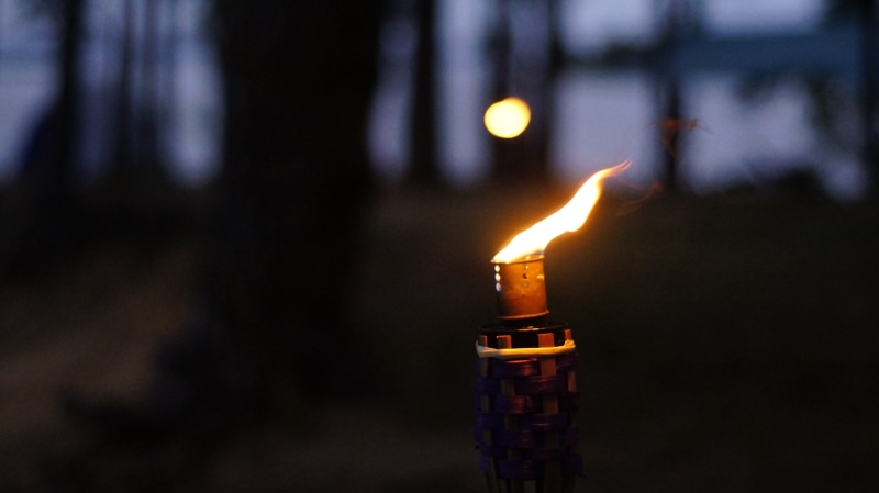 fire - natural phenomenon, dark, burn, fire, single object, night, melting, indoors, light, flame, burning, religion, architecture, glowing, candle, electric lamp