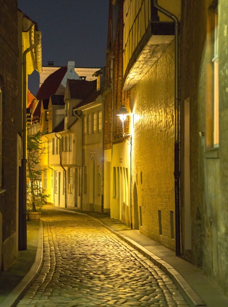 architecture, lighting equipment, direction, building, built structure, footpath, pavement, empty, floor, narrow, no people, street light, lübeck, sidewalk