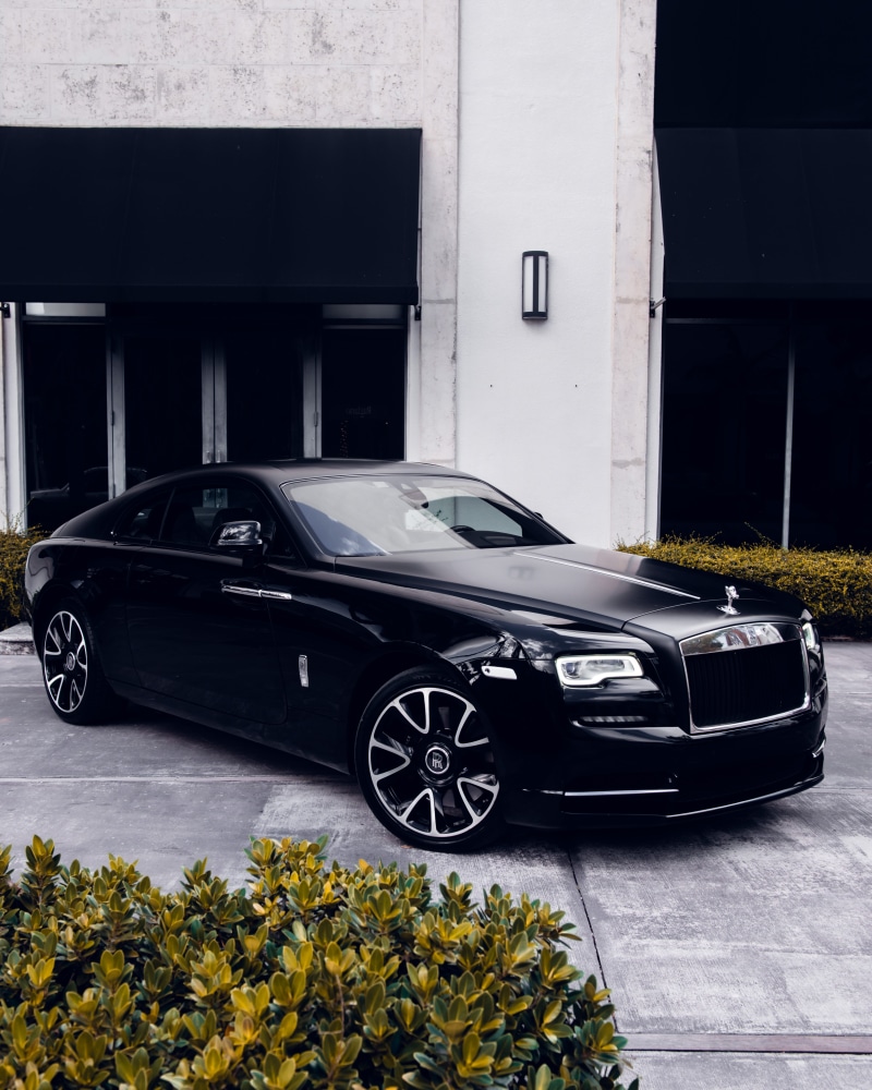 tire, coupe, hubcap, mode of transportation, door, car wheel, sports car, growth, car, architecture, built structure, flower, no people, garage, plant