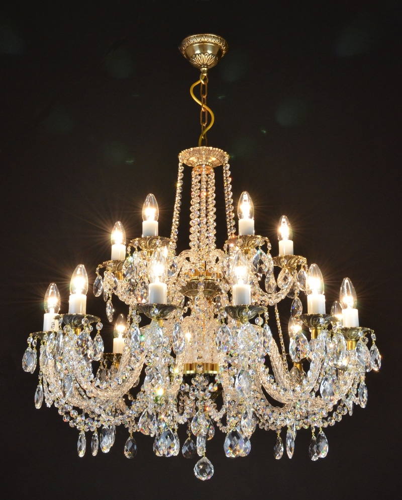 light - natural phenomenon, pendant light, decoration, low angle view, black background, brown, luxury, swarovski, candle, elegance, lighting equipment