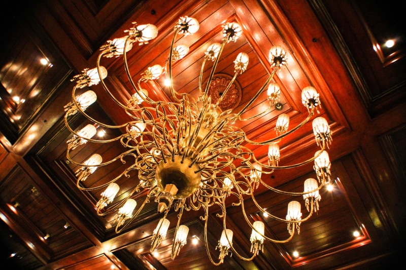 lighting equipment, cupola, creativity, hotel, hanging, interior, chandelier, electric light, wealth, gold, light fixture, building, uplight, architecture