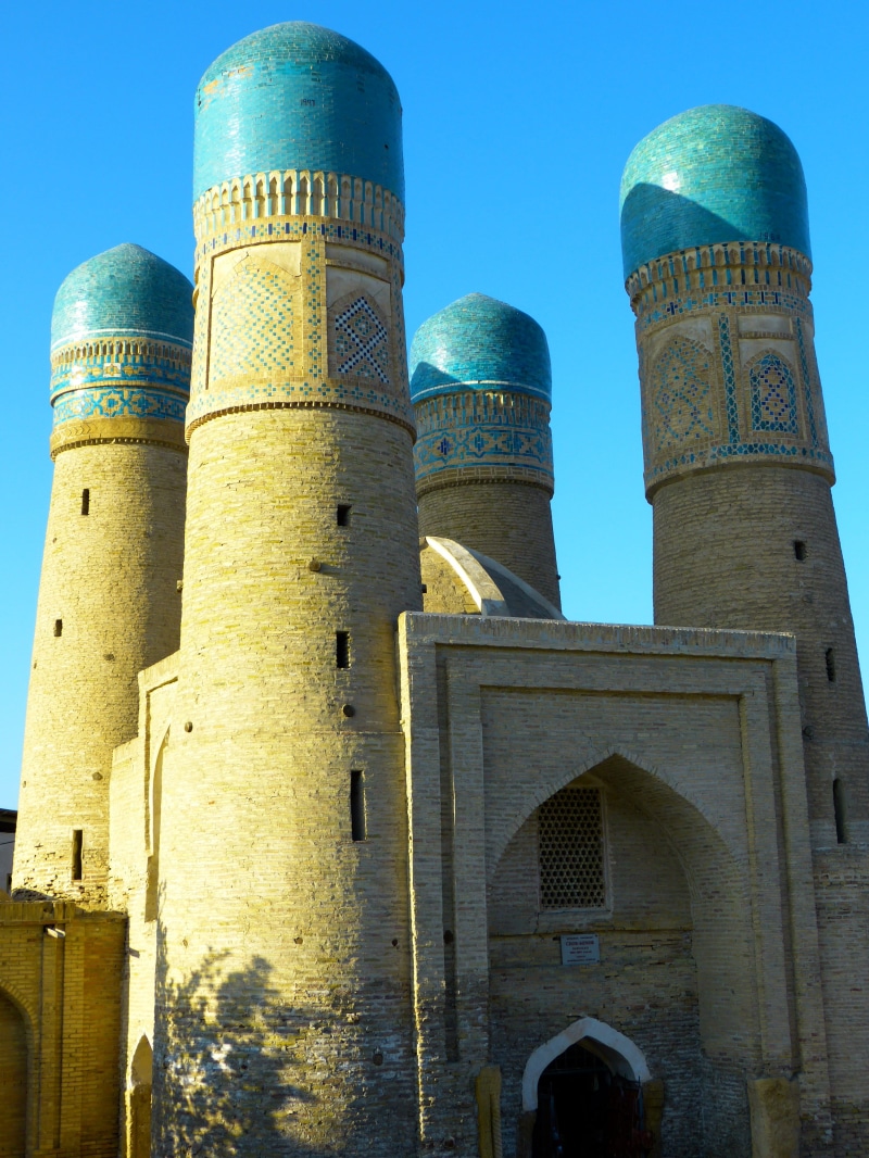 outdoors, religion, day, ancient, minaret, bukhara, blue, no people, nature, travel destinations, minor choir, pray, building exterior, sky, uzbekistan
