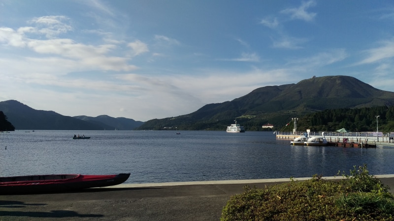 beauty in nature, scenics - nature, tranquility, travel destinations, Japan, Lake Ashi, travel, passenger craft, water, lake, sky, land, yacht, sailboat