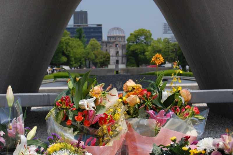 outdoors, built structure, flower arrangement, flowering plant, bouquet, nuclear dome, 2K, hiroshima, hiroshima peace memorial museum, religion, close-up