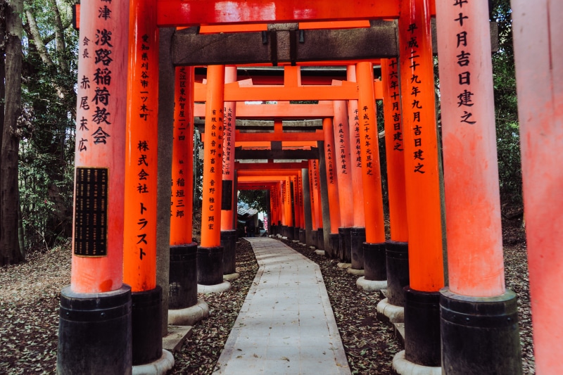 kyoto, communication, gate, worship, spirituality, built structure, non-western script, office building, diminishing perspective, orange color, in a row
