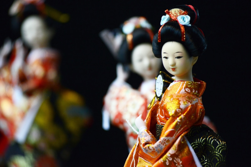 indoors, kimono, memoirs of a geisha, creativity, close-up, religion, female likeness, japanese, craft, human representation, art and craft, doll, male likeness