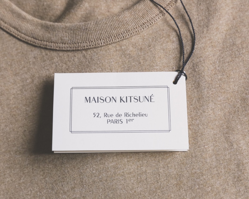 jumper, communication, still life, clothing, pullover, business card, no people, information, t-shirt, apparel, fabric, home decor, day, capital letter