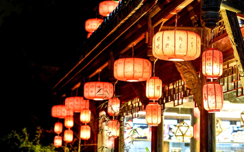 no people, jinli, lantern, chinese lantern, outdoors, repetition, chinese new year, non-western script, celebration, beautiful, lighting equipment, building exterior