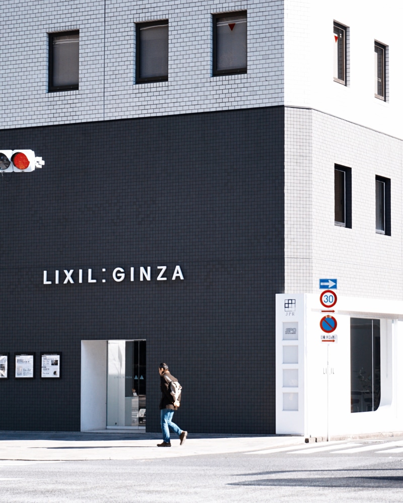 text, western script, town, road sign, ginza, leisure activity, architecture, built structure, communication, urban, outdoors, sign, day, brick, office building
