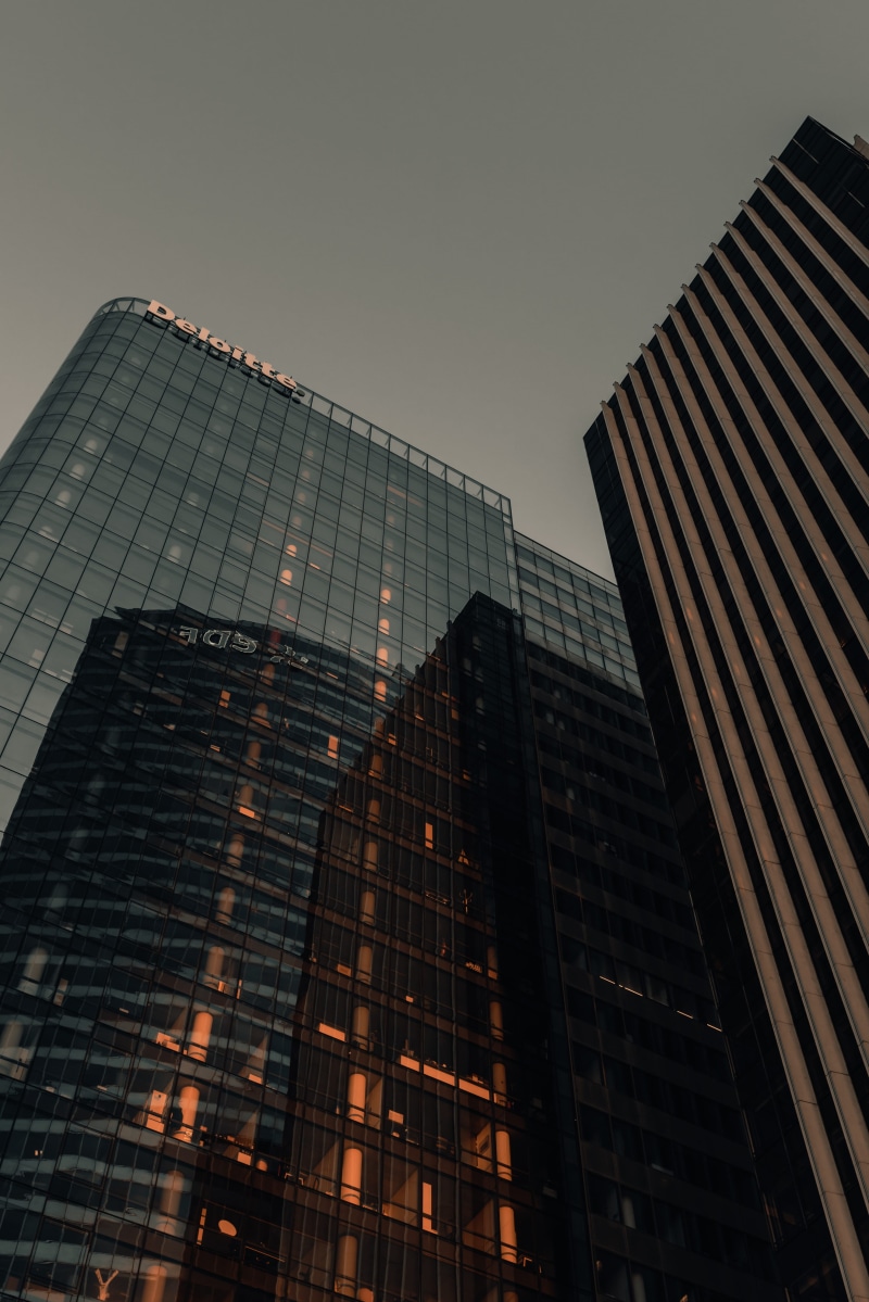 urban, buildings, glass - material, low, look up, no people, angle, office building exterior, skyscraper, sky, reflection, office, outdoors, intersection