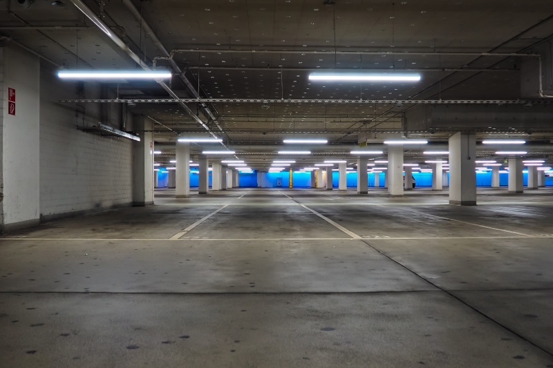 lighting equipment, grey, building, architecture, direction, underground, transportation, parking, illuminated, public transportation, indoors, parking lot