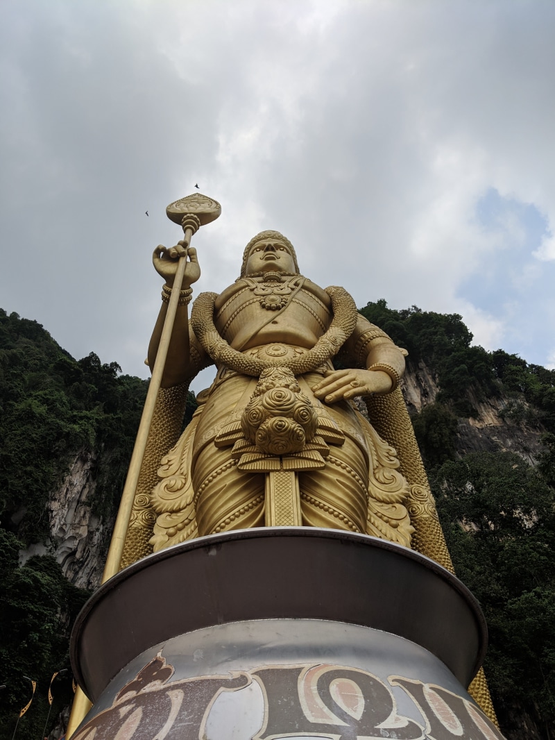 art and craft, statue, temple, solid, religion, mountain, spirituality, banister, outdoors, handrail, sky, railing, tower, day, worship, no people, symbol