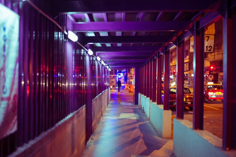 arcade, light, human, person, city, building exterior, corridor, vehicle, indoors, real people, the way forward, floor, illuminated, automobile, flooring
