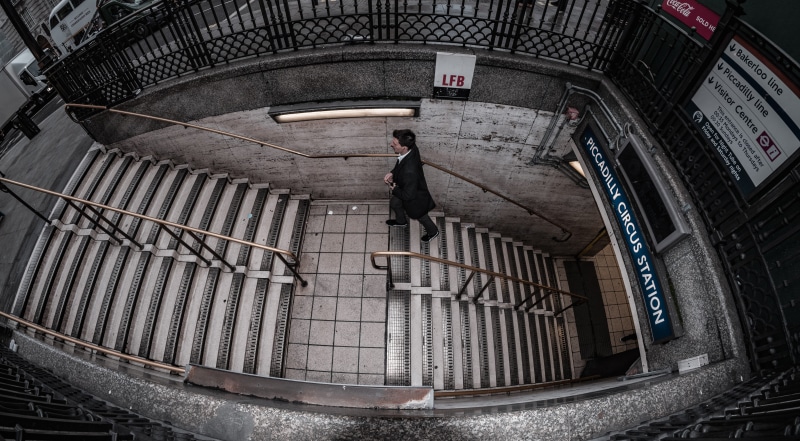 pottery, apparel, prison, lifestyles, full length, built structure, walking, tree, vase, one person, person, clothing, banister, crypt, wideangle fisheye fujifilm london tube station piccadilly circus