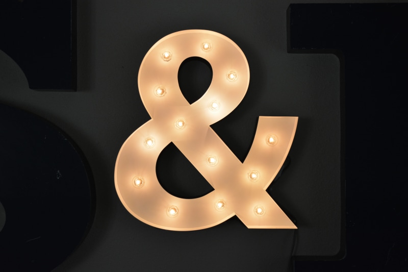 bulbs, symbol, ampersand, logo, illuminated, shape, night, still life, alphabet, pastry, emblem, dessert, shiny, arts culture and entertainment, candle
