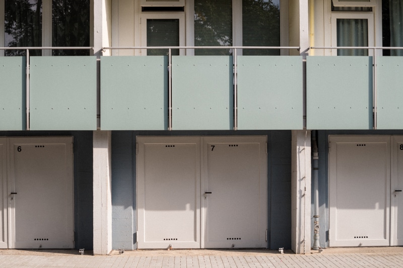 outdoors, handrail, apartment building, industry, absence, door, home decor, building, window, curtain, business, shutter, high rise, architecture, day