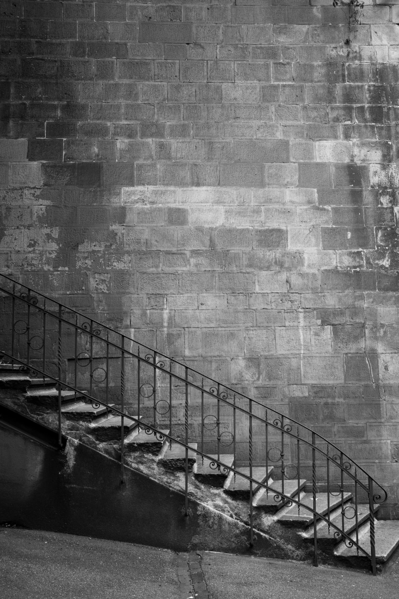 indoors, building exterior, absence, brick wall, clothing, staircase, architecture, graffiti, basement, weathered, fashion, outdoors, nature, no people